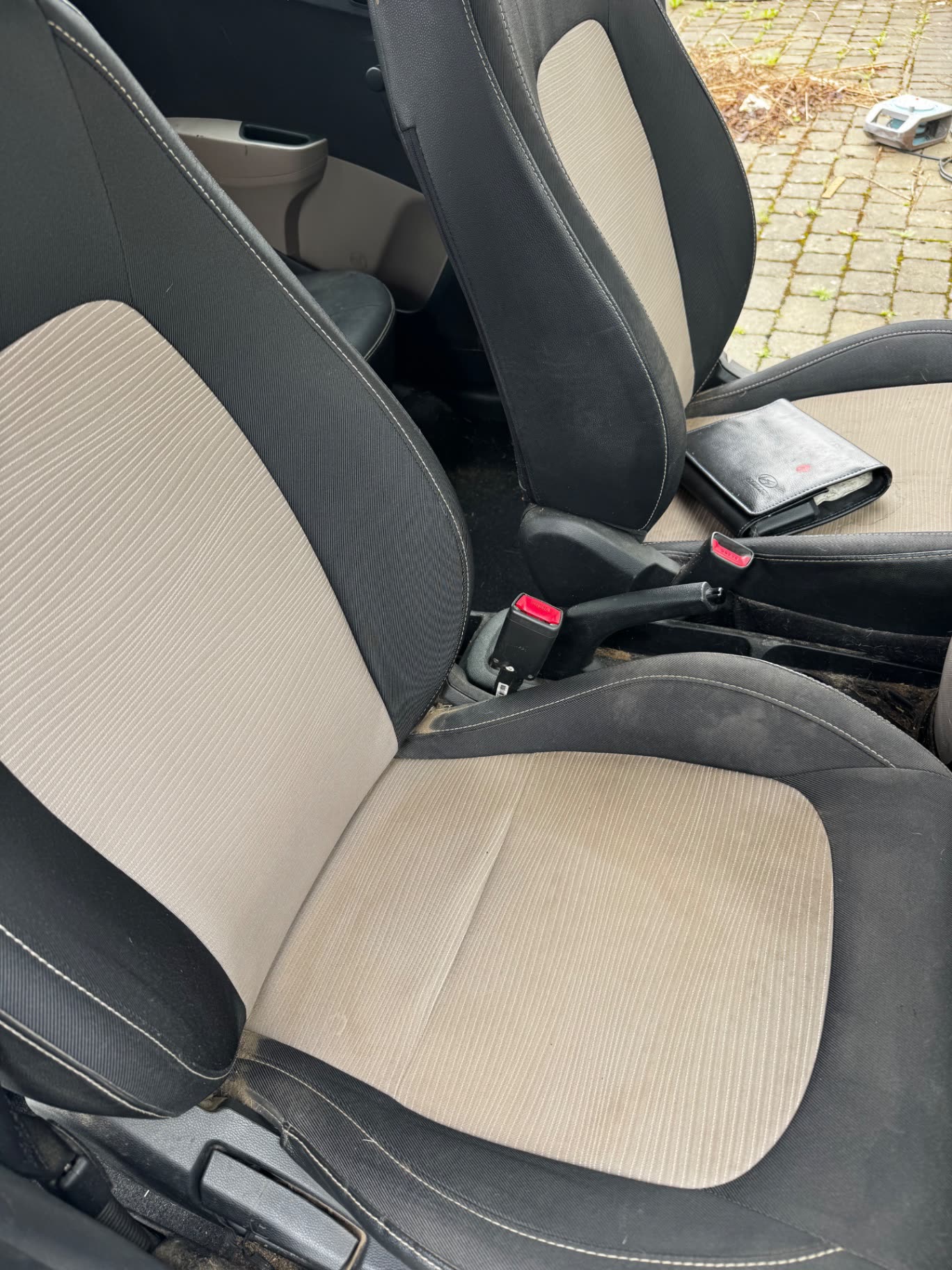 Car front seats before Detail Lab interior detailing